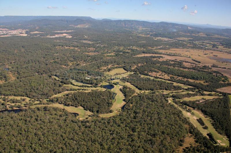 Population change and issues in Coomera, Queensland.